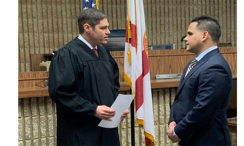Judge Michael Davis Swears in New Attorney