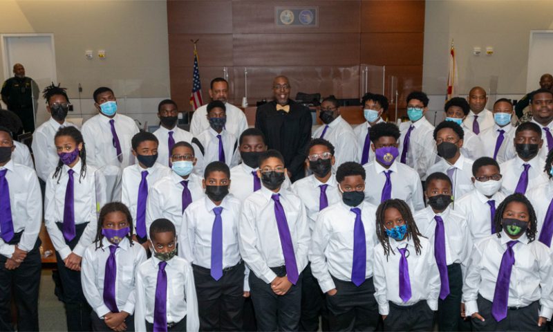 Omega Psi Phi Gentlemen of Influence and Q-Unit Mentoring Group Visit Courthouse