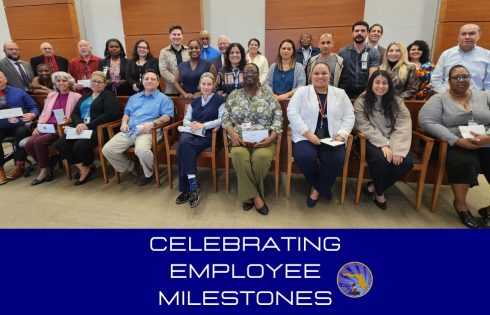 photo of employees honored for work milestones